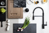 Matte black one-handle high arc pulldown kitchen faucet