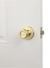 Kwikset  Tylo  Polished Brass  Steel  Passage Door Knob  3  Right or Left Handed