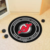 NHL - New Jersey Devils Hockey Puck Rug - 27in. Diameter