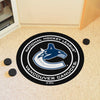 NHL - Vancouver Canucks Hockey Puck Rug - 27in. Diameter