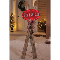 Celebrations  Clear  Skis with Bow and Fa La La Sign  Yard Decor